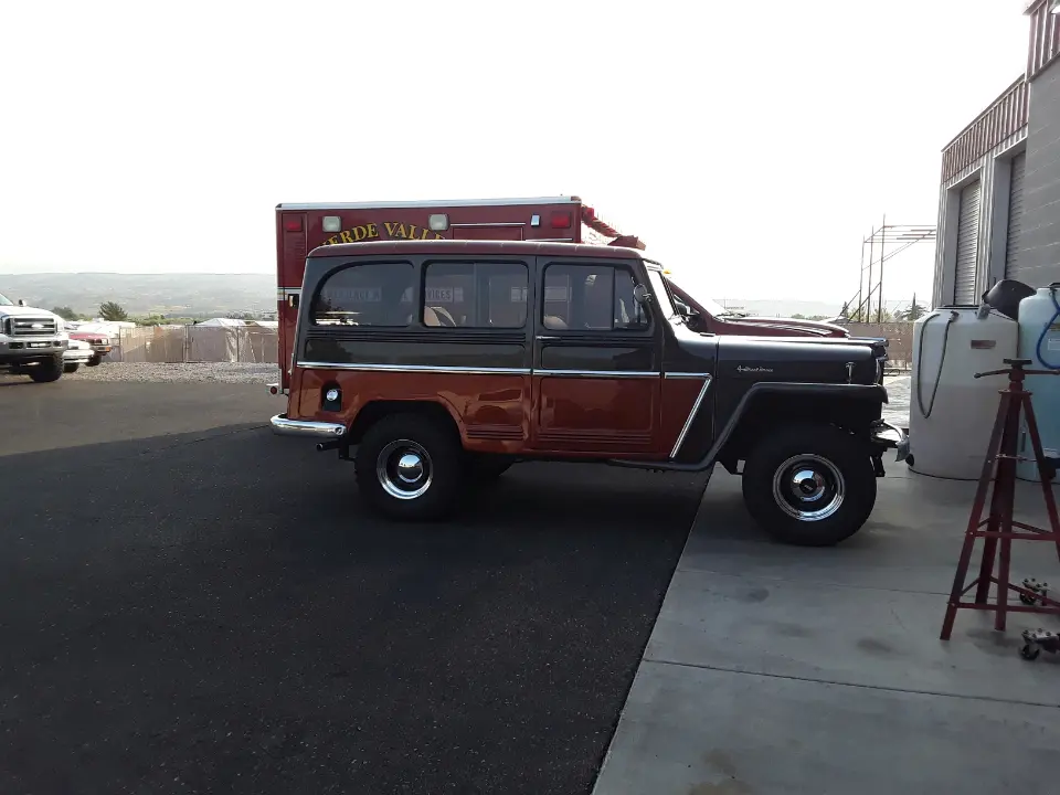 A jeep parked on the side of a road.